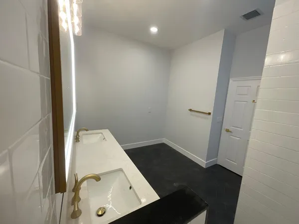 a view of an empty walk in closet