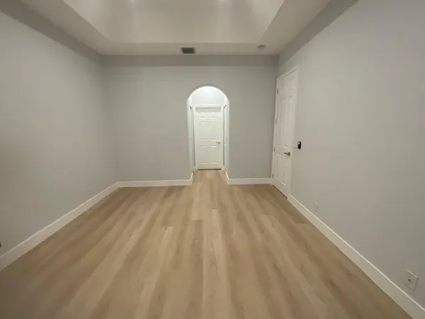a view of a kitchen and a window