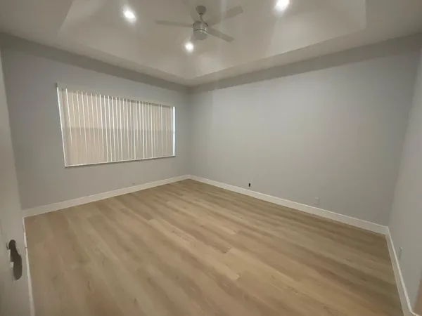 a kitchen with a refrigerator sink and stove