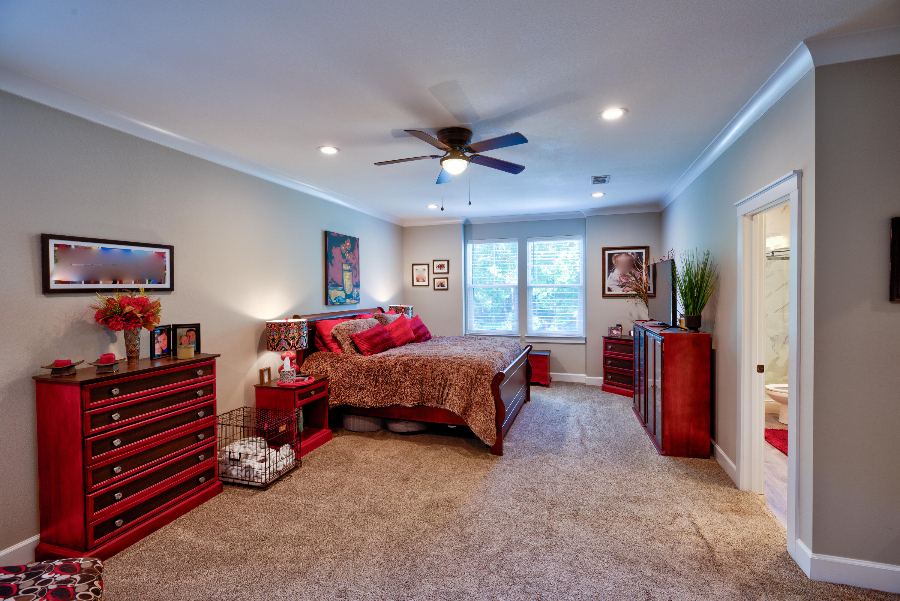 527 Maple Avenue Niceville, FL 32578 - Photo 16 of 42 a bedroom with furniture and a chandelier