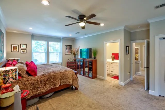 a bedroom with a bed and furniture