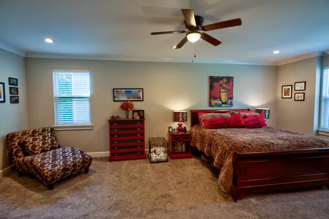 a view of room with walk in closet and a window