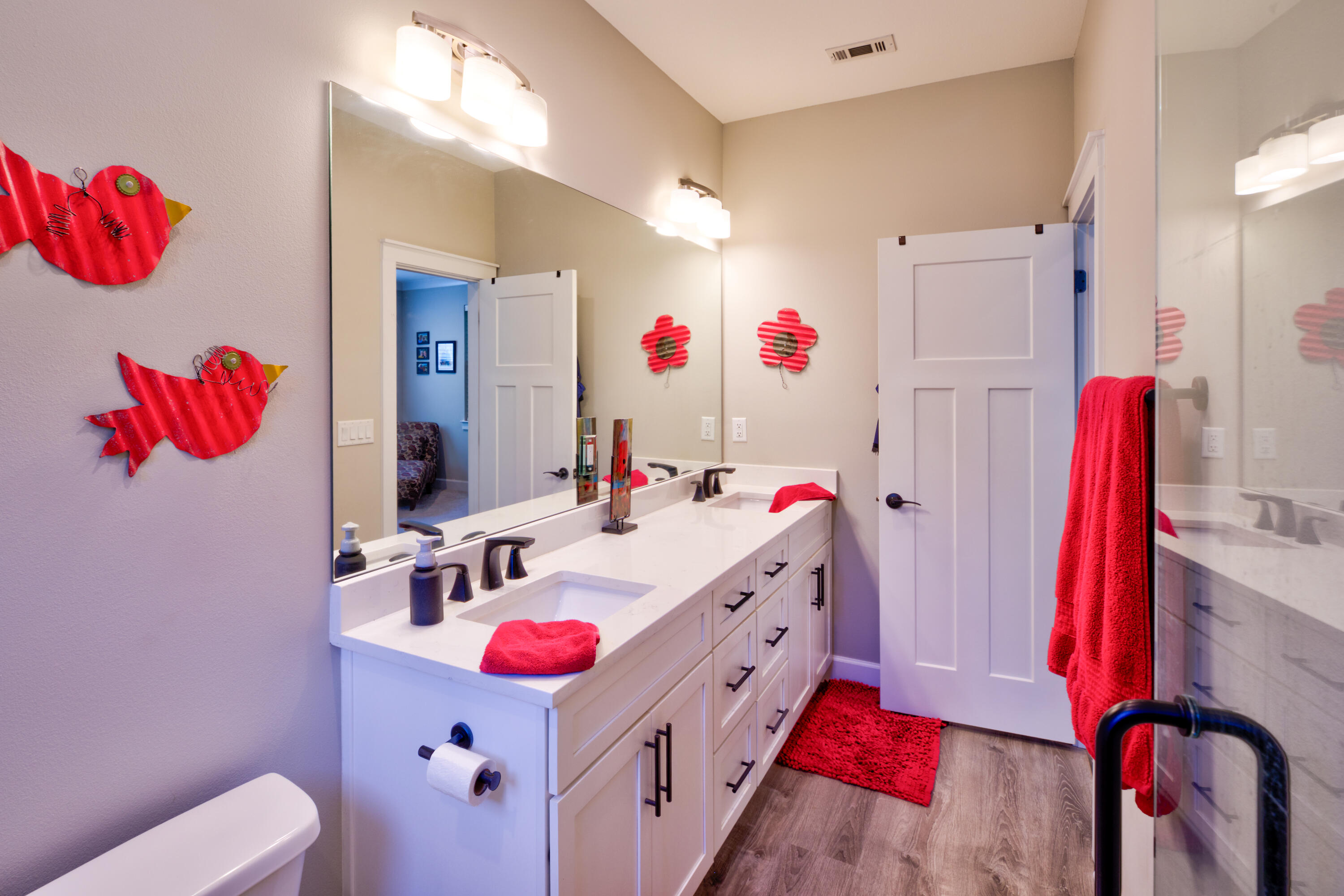 527 Maple Avenue Niceville, FL 32578 - Photo 25 of 42 a bed room with a bed window and a flat screen tv