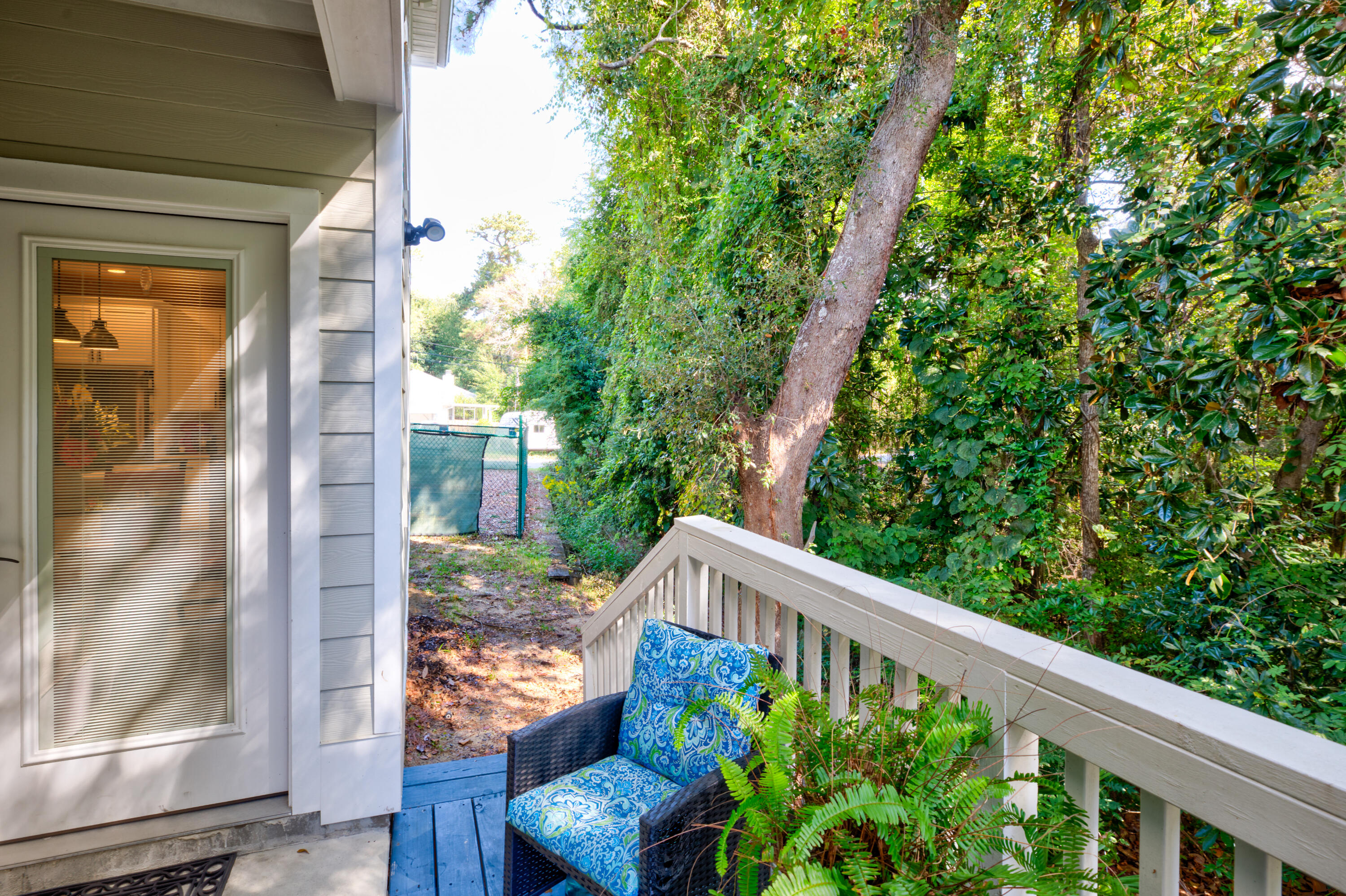 527 Maple Avenue Niceville, FL 32578 - Photo 40 of 42 a view of a balcony with wooden floor
