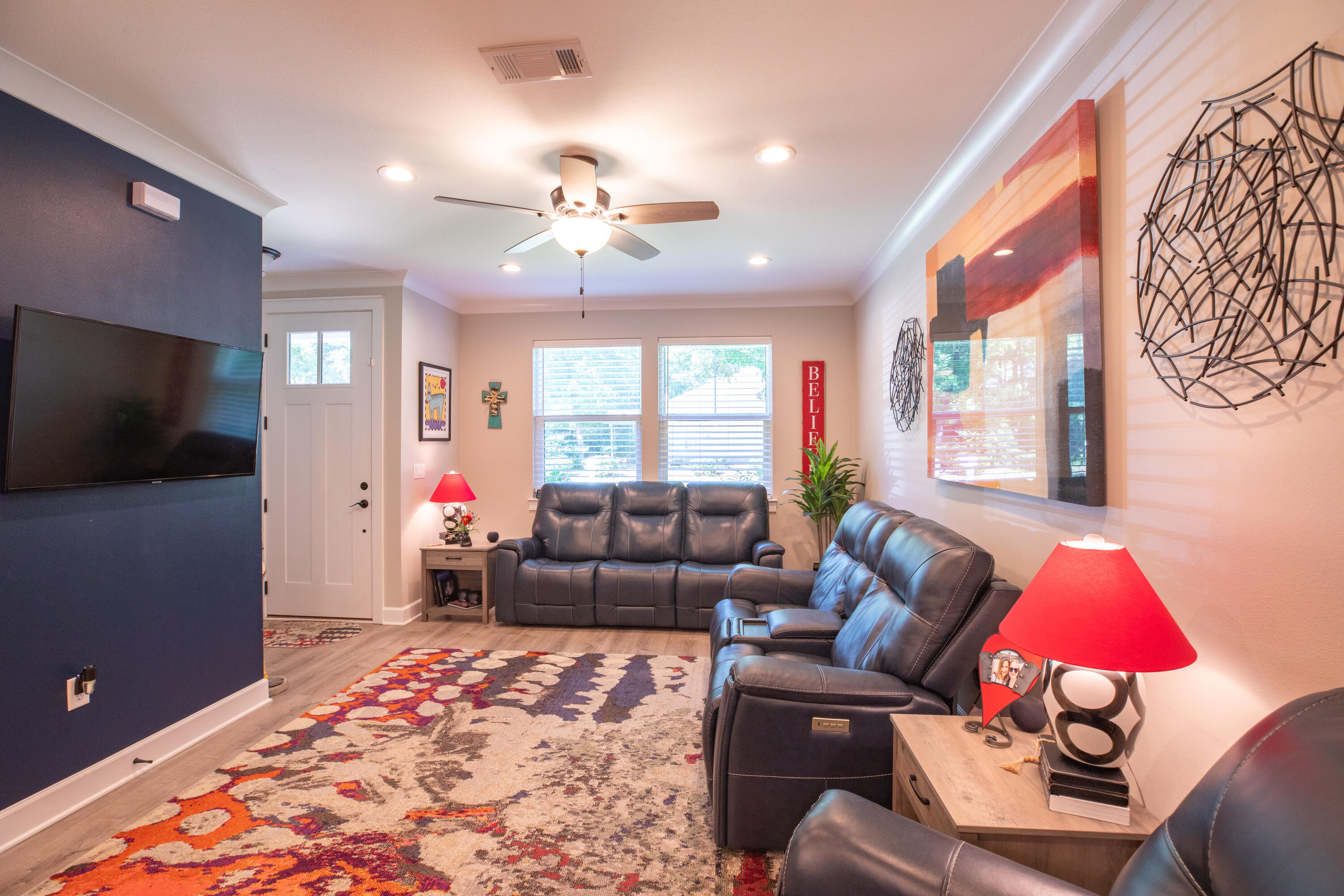 527 Maple Avenue Niceville, FL 32578 - Photo 4 of 42 a living room with furniture and a flat screen tv