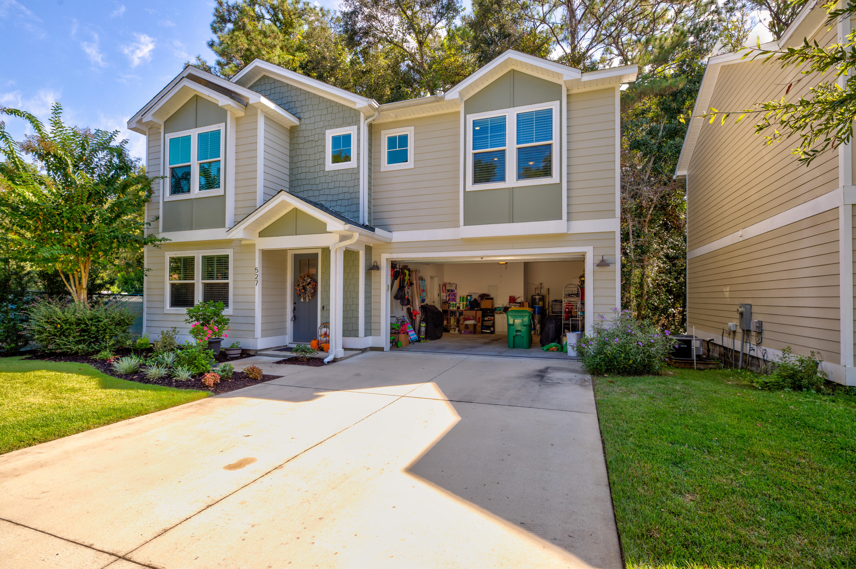 527 Maple Avenue Niceville, FL 32578 - Photo 41 of 42 a front view of a house with yard and green space
