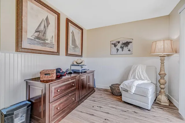 a room with furniture and wooden floor