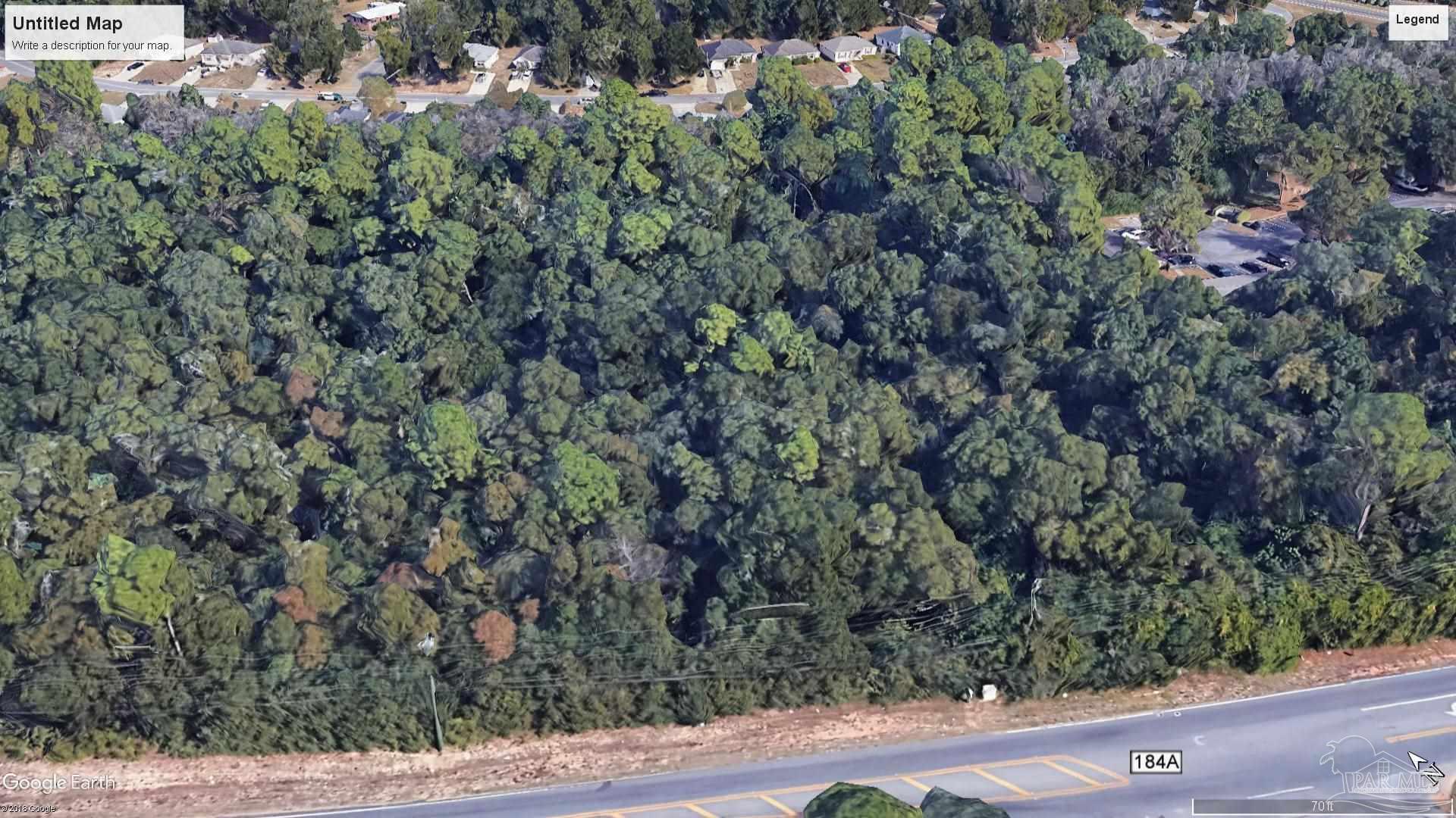 6200 Berryhill Road Milton, FL 32570 - Photo 3 of 4 an outdoor view of house with green space