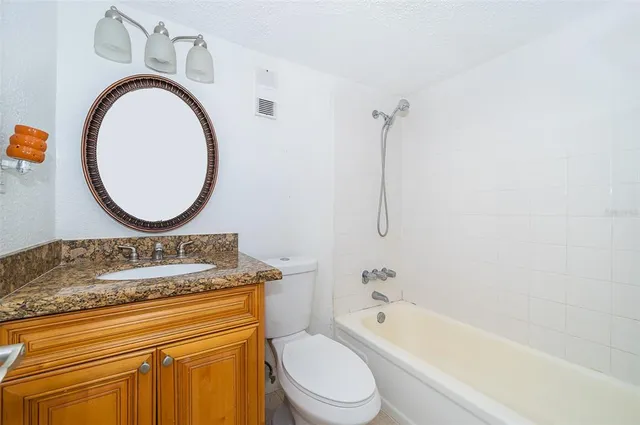 a view of a garden with a street