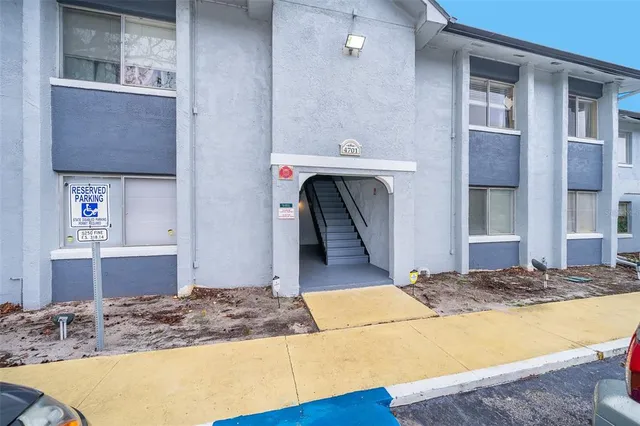a living room with granite countertop furniture and a fireplace