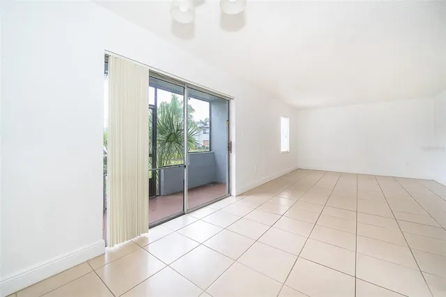 a view of an empty room and window