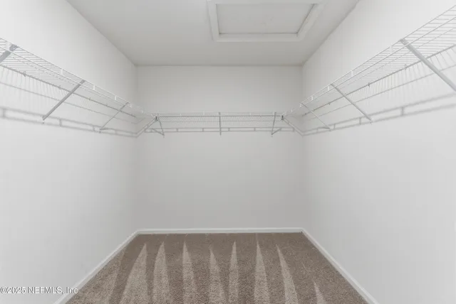 a view of a room with racks on the wall