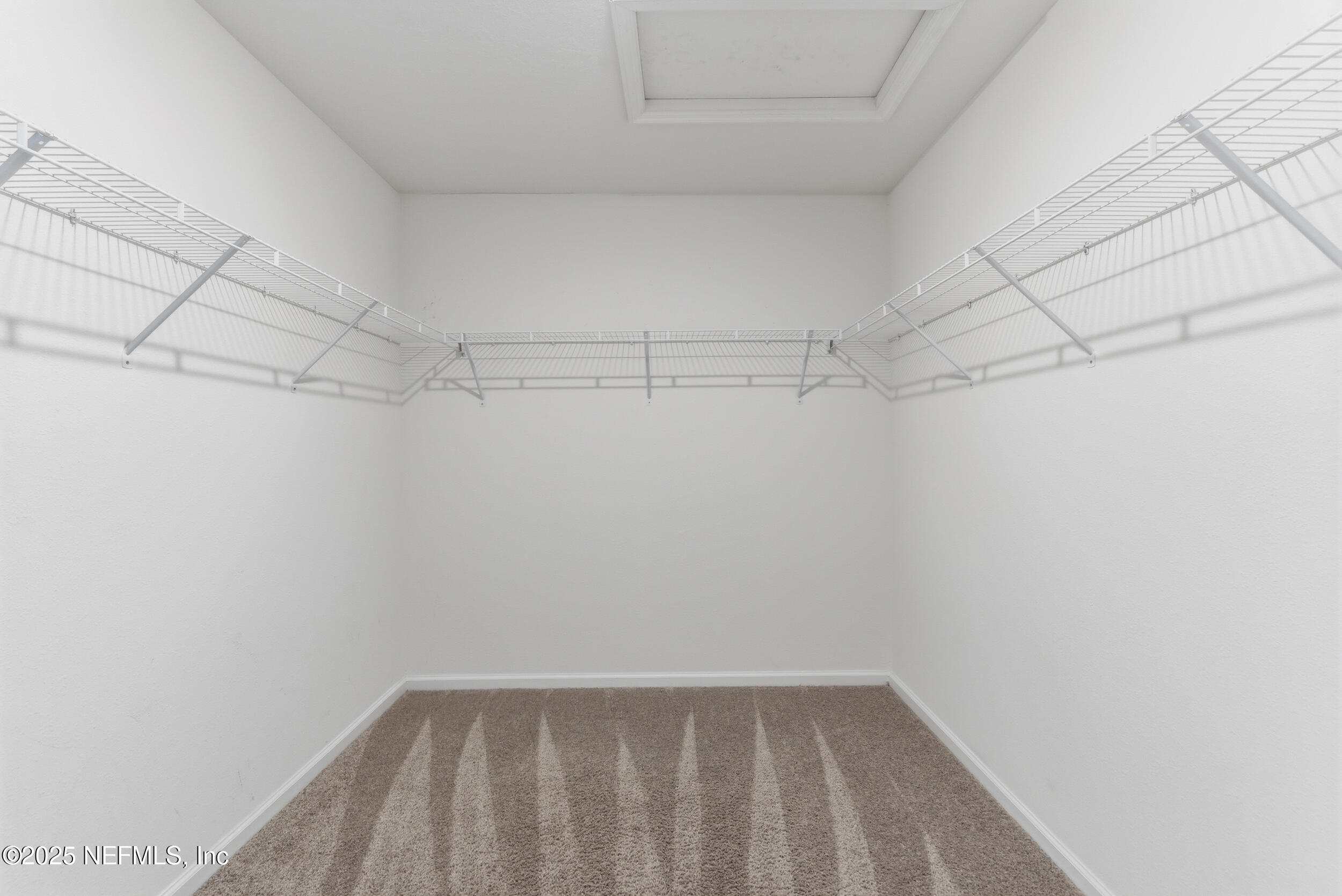 11624 Double Eagle Court Jacksonville, FL 32221 - Photo 23 of 53 a view of a room with racks on the wall