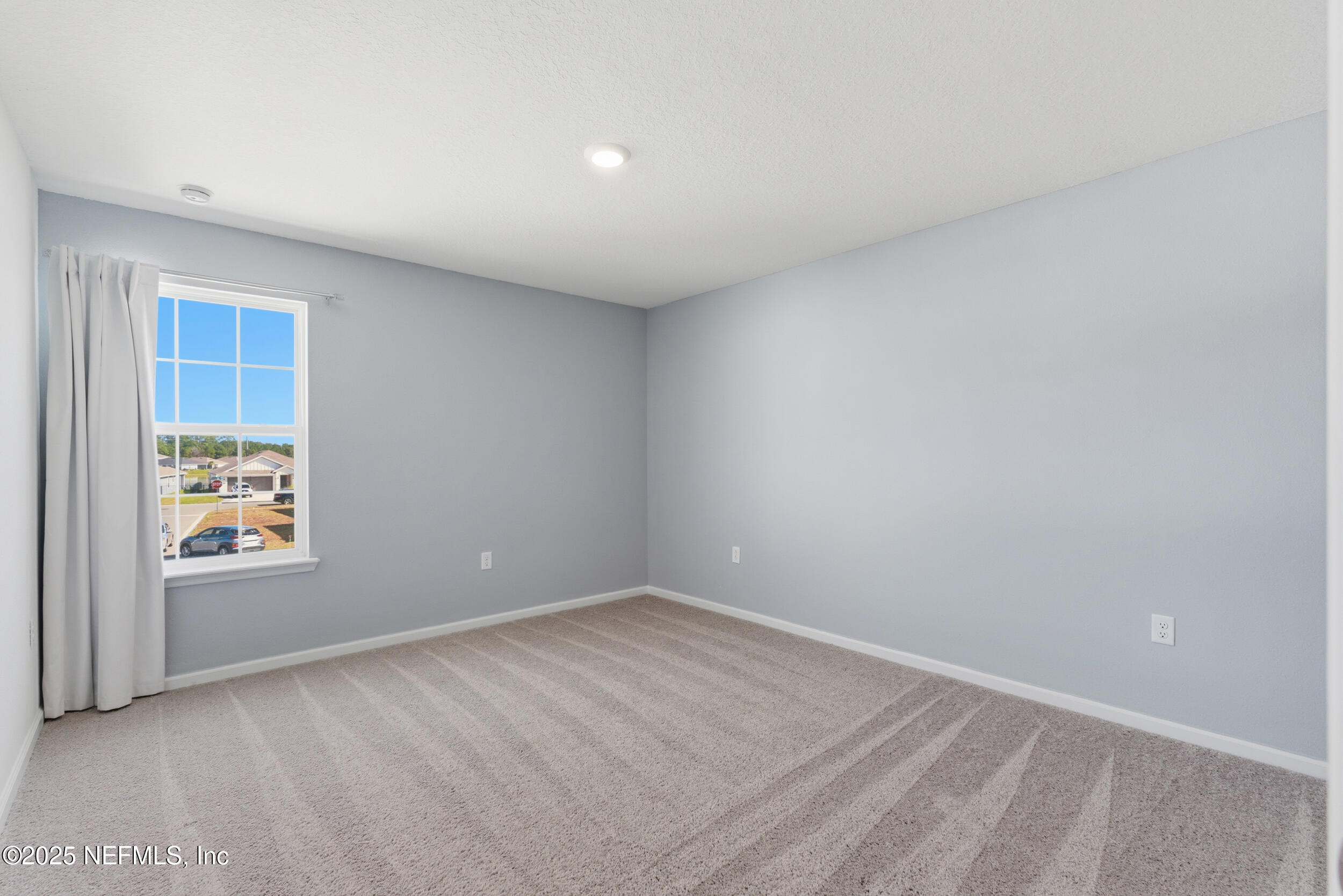 11624 Double Eagle Court Jacksonville, FL 32221 - Photo 26 of 53 an empty room with windows