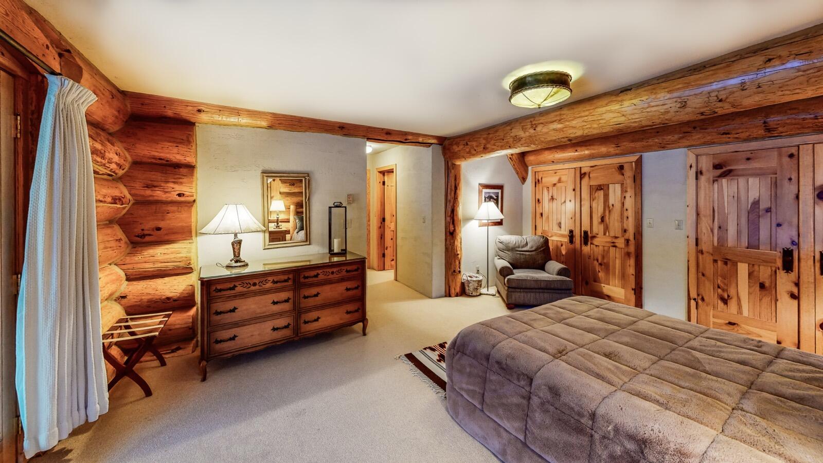 2418 Usfs Road Creede, CO 81130 - Photo 43 of 50 a bedroom with a bed and a mirror