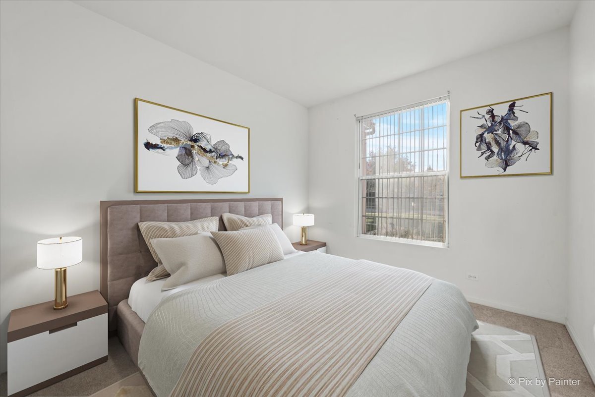 2237 Concord Drive, Unit 2237 McHenry, IL 60050 - Photo 15 of 19 a bedroom with a bed and a window