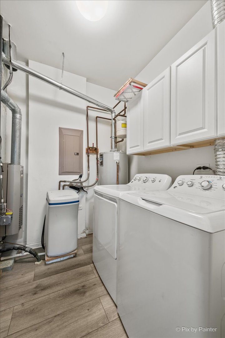 2237 Concord Drive, Unit 2237 McHenry, IL 60050 - Photo 18 of 19 a room with a sink and cabinets