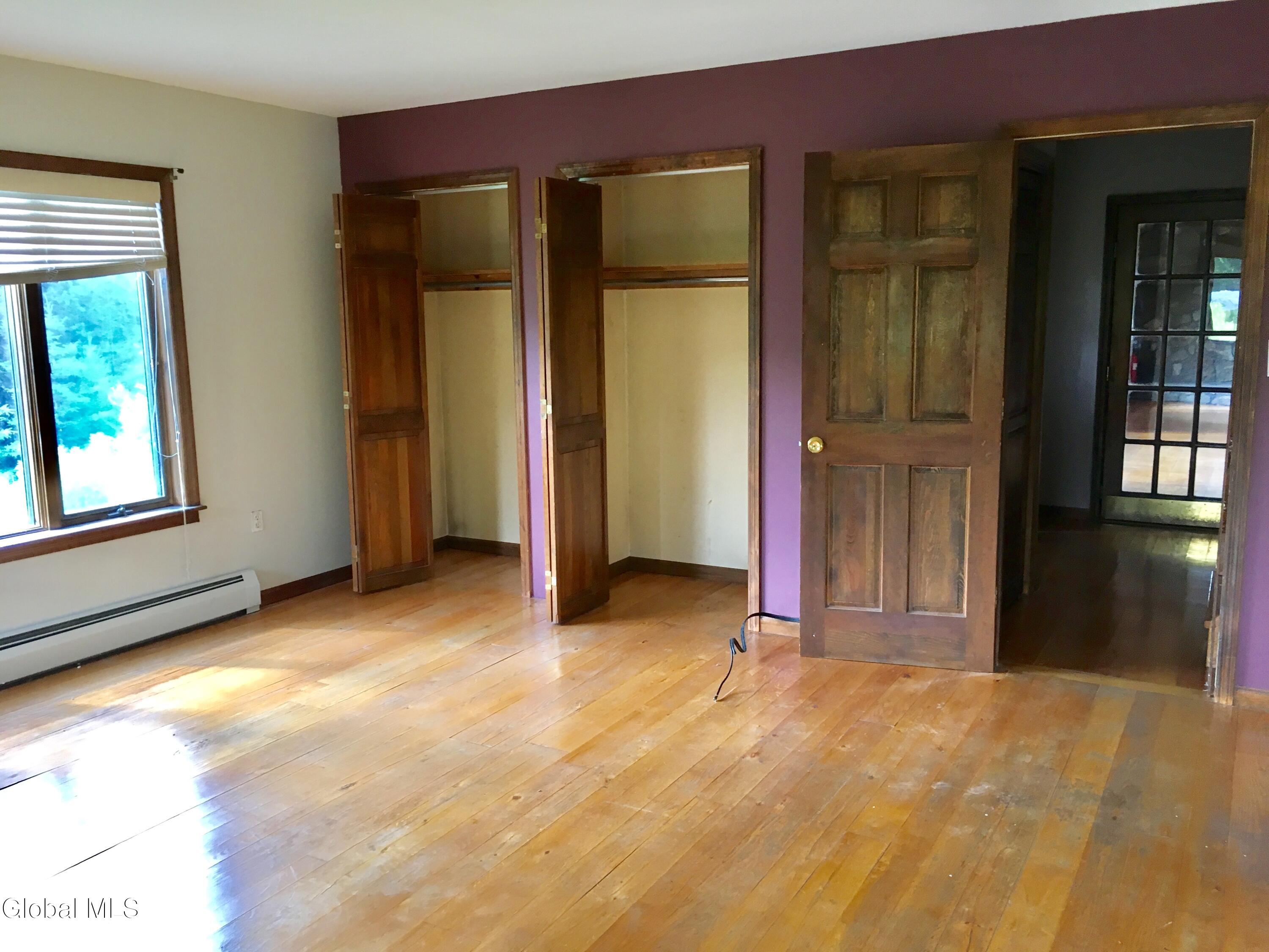 1462 West Fulton Road, Unit 1 Fulton, NY 12187 - Photo 5 of 15 12 master bedroom