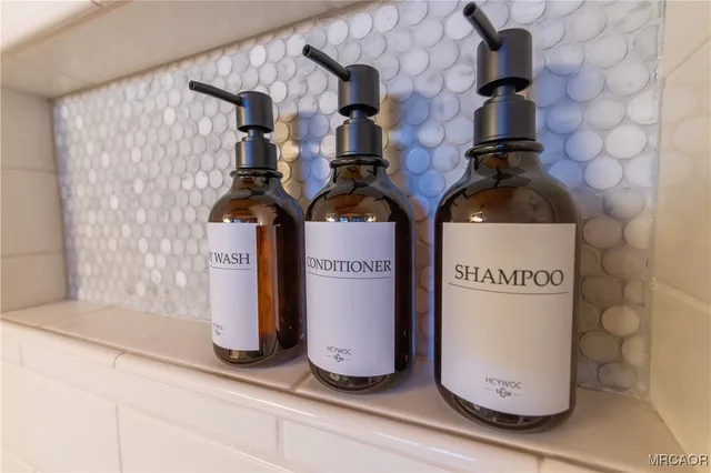 a kitchen with a sink stove and refrigerator