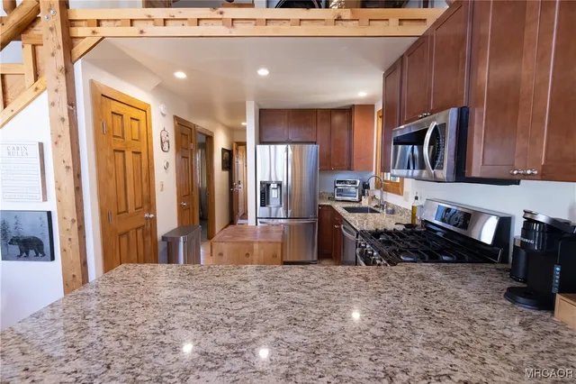 a view of a living room with furniture