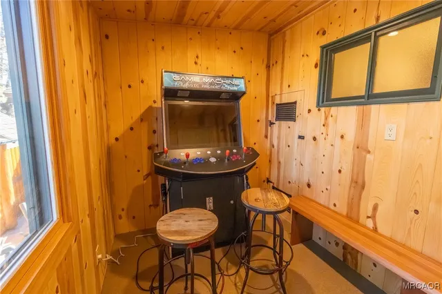a bathroom with a bathtub a sink and mirror