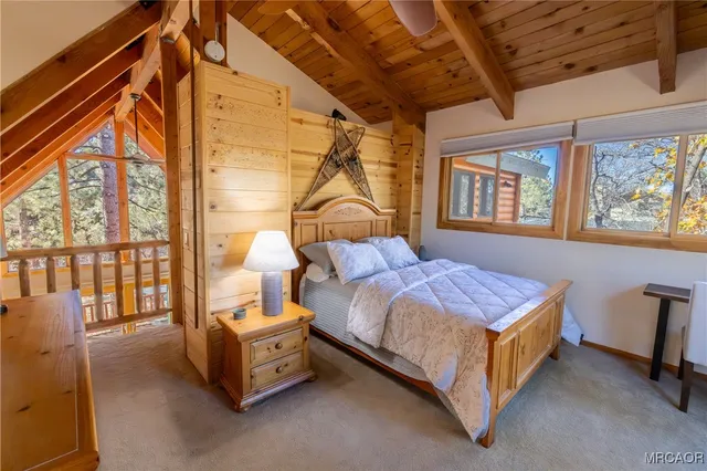a view of a table and chairs on the roof deck
