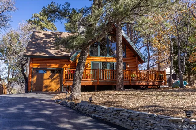 a view of a chairs and table on the wooden floor