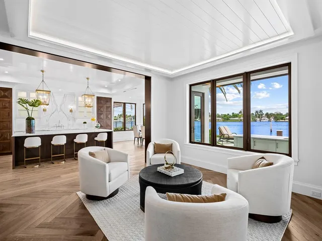 a kitchen with stainless steel appliances kitchen island hardwood floor and wooden floors
