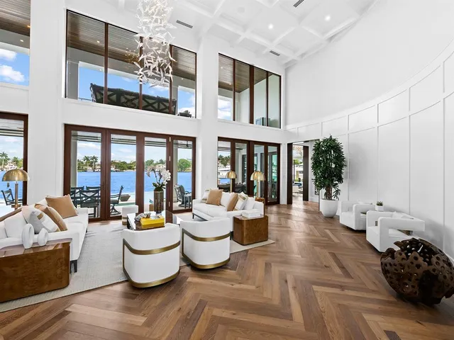 a large kitchen with stainless steel appliances granite countertop a lot of counter space