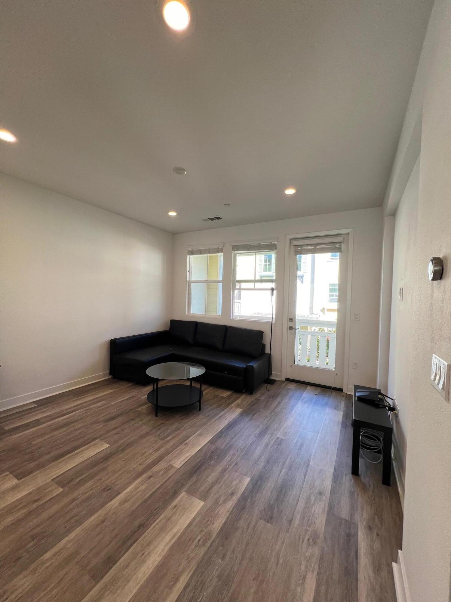 519 Bolinas Way, Unit 104 Goleta, CA 93117 - Photo 13 of 22 a living room with furniture and a window