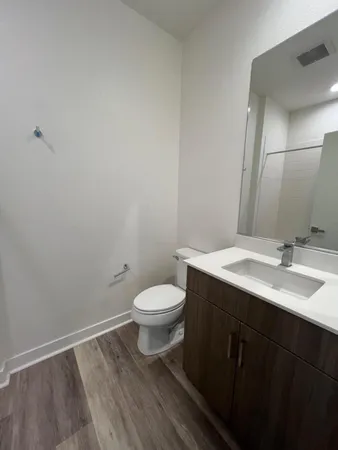 a bathroom with a sink and a toilet