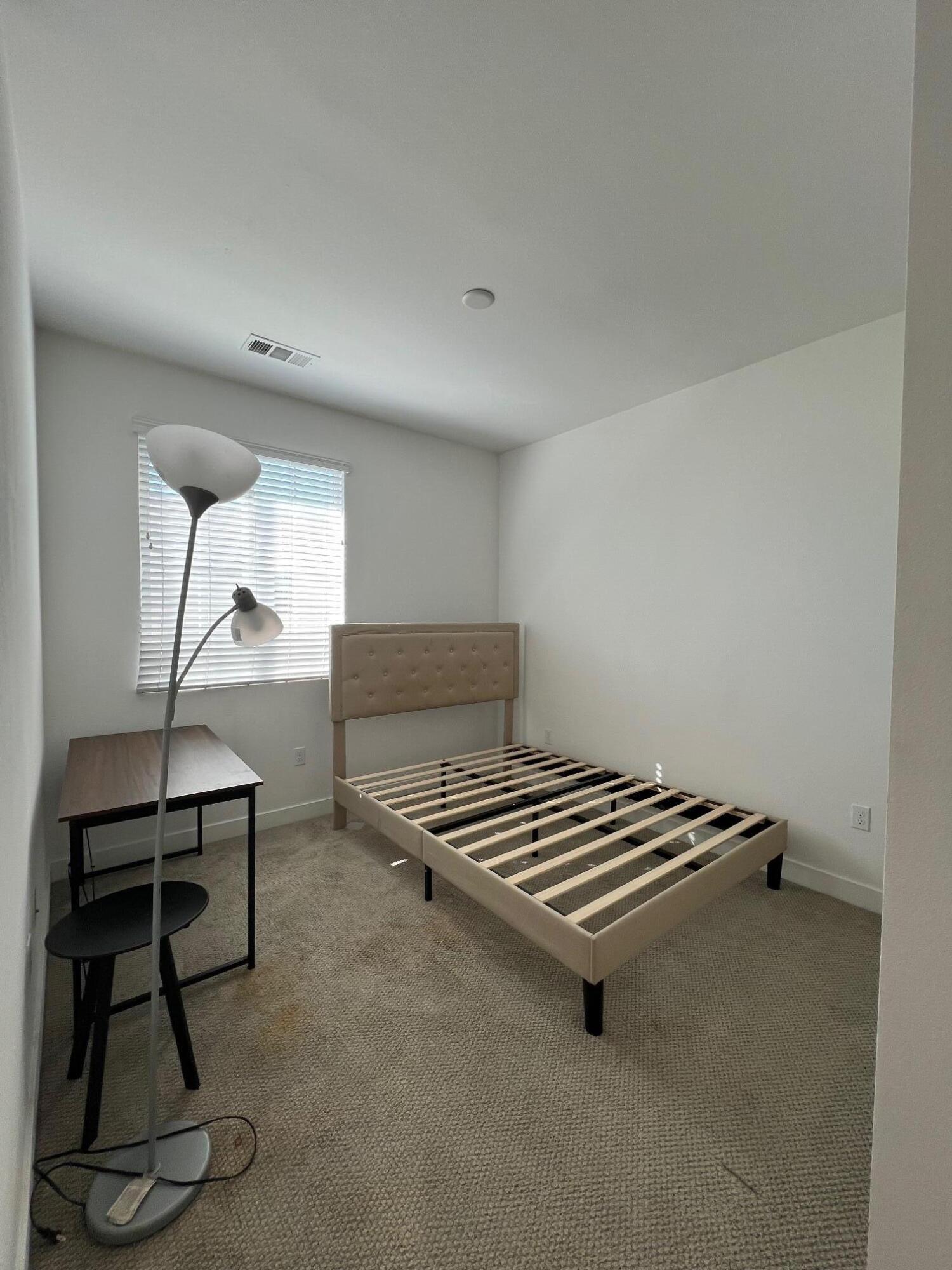 519 Bolinas Way, Unit 104 Goleta, CA 93117 - Photo 21 of 22 a room with gym equipment and wooden floor