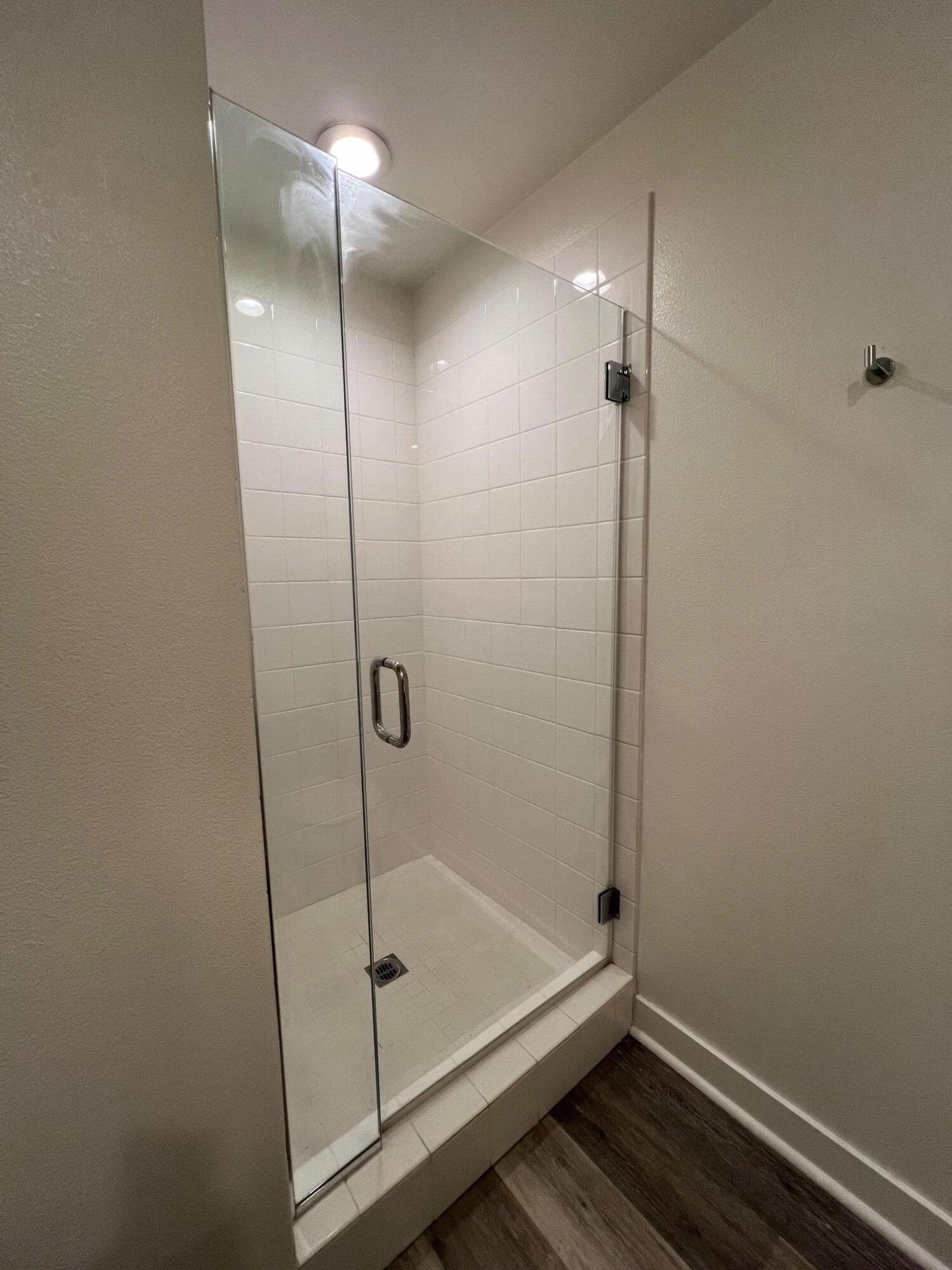 519 Bolinas Way, Unit 104 Goleta, CA 93117 - Photo 9 of 22 a bathroom with a shower and a toilet