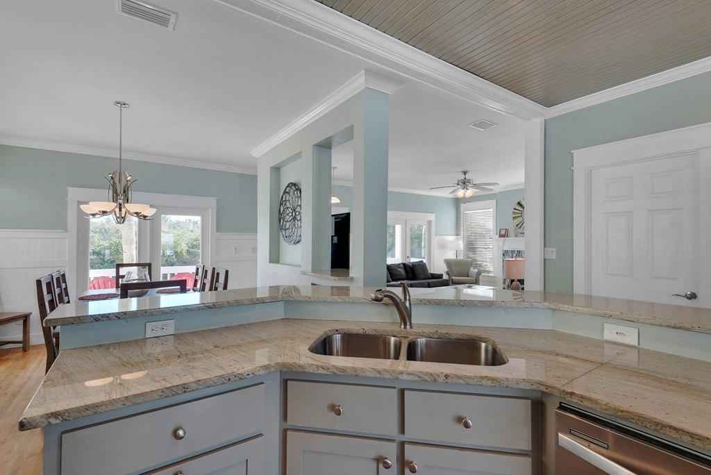 68 Cobia Street Destin, FL 32541 - Photo 13 of 47 a kitchen with sink and cabinets