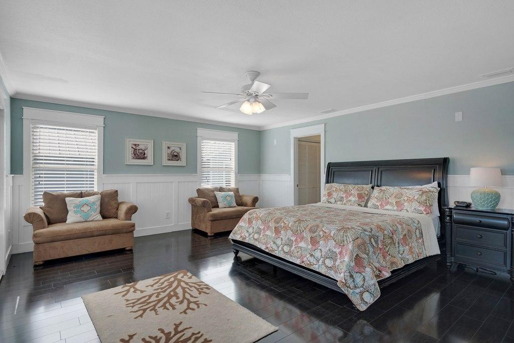 68 Cobia Street Destin, FL 32541 - Photo 15 of 47 a bedroom with a bed and a couch
