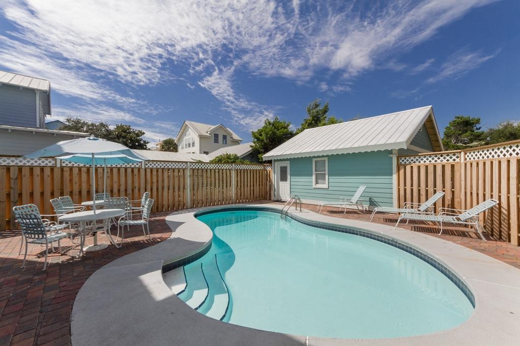 68 Cobia Street Destin, FL 32541 - Photo 21 of 47 a view of a house with backyard sitting area and furniture