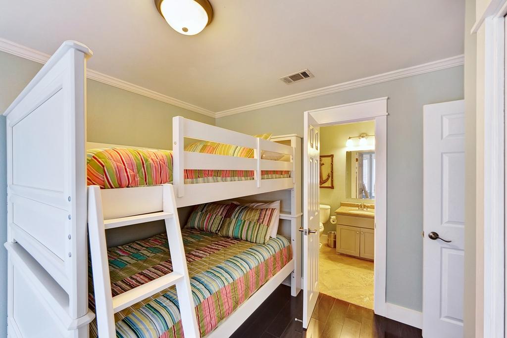 68 Cobia Street Destin, FL 32541 - Photo 38 of 47 a bedroom with a bed and a window