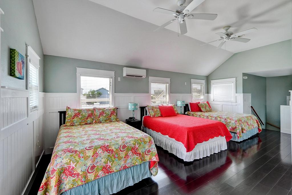 68 Cobia Street Destin, FL 32541 - Photo 40 of 47 a bedroom with two beds and a window