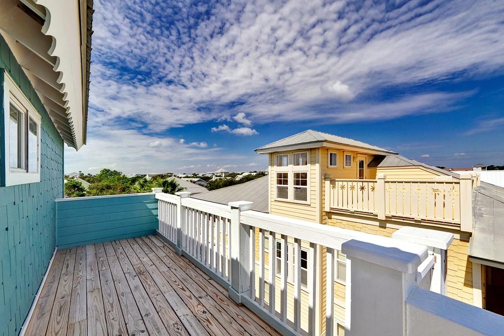 68 Cobia Street Destin, FL 32541 - Photo 42 of 47 a view of balcony with wooden floor and fence