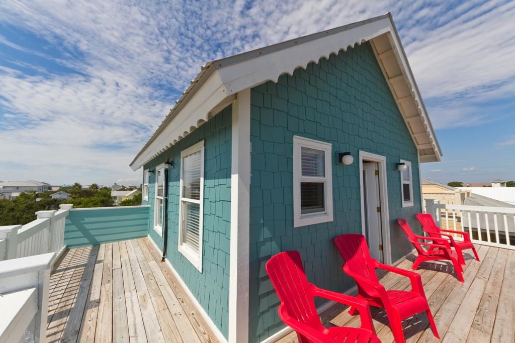 68 Cobia Street Destin, FL 32541 - Photo 43 of 47 a balcony with wooden floor table and chairs