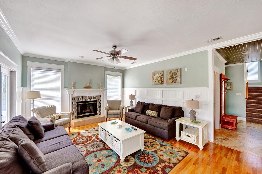 68 Cobia Street Destin, FL 32541 - Photo 6 of 47 a living room with furniture and a fireplace