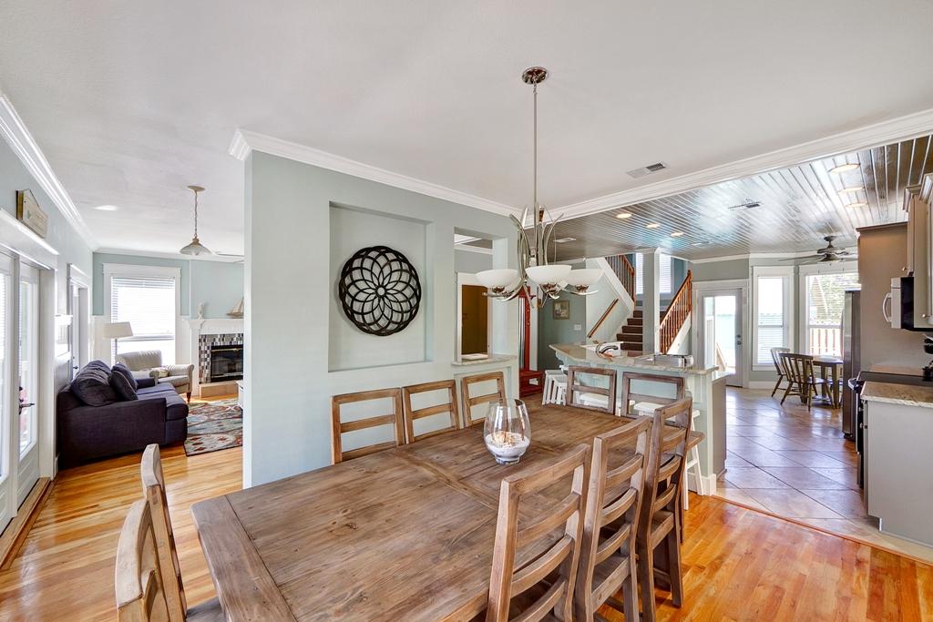 68 Cobia Street Destin, FL 32541 - Photo 9 of 47 a living room with lots of furniture and kitchen view