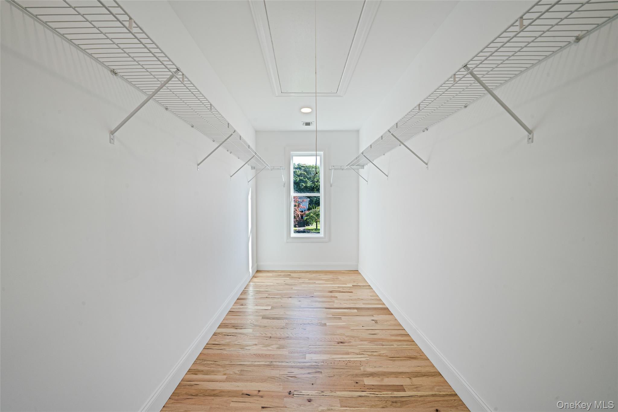 817 Pond View Road Riverhead, NY 11901 - Photo 34 of 36 a view of a hallway with window