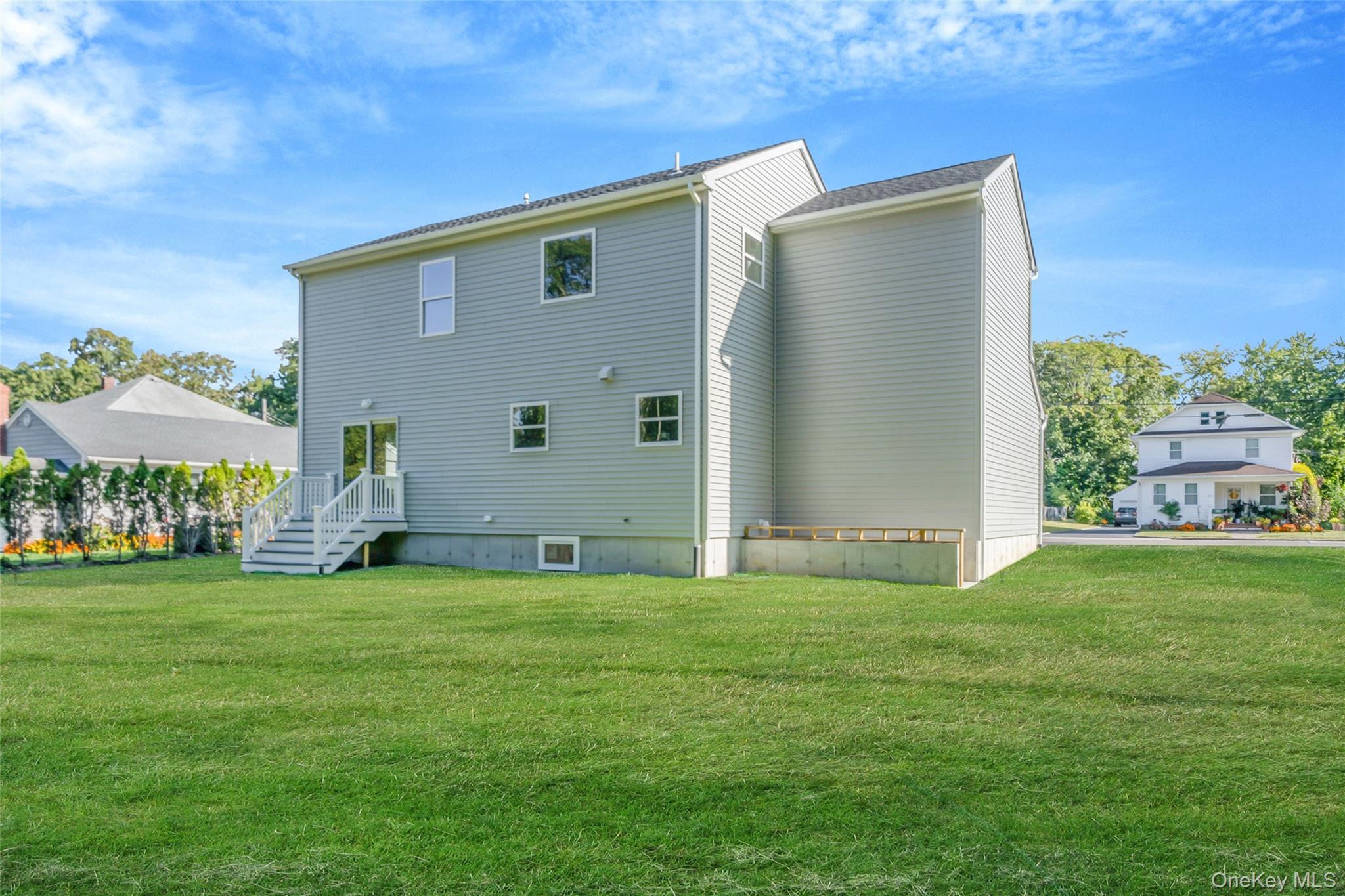 817 Pond View Road Riverhead, NY 11901 - Photo 7 of 36 a view of a back yard of the house