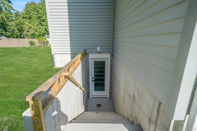 a view of house and backyard