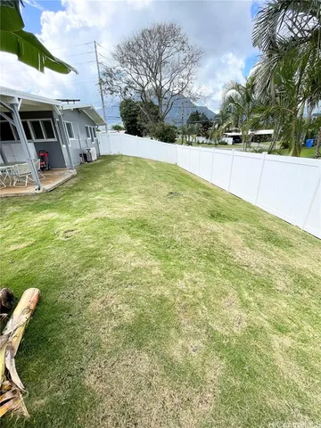 a view of an chairs and tables in the patio