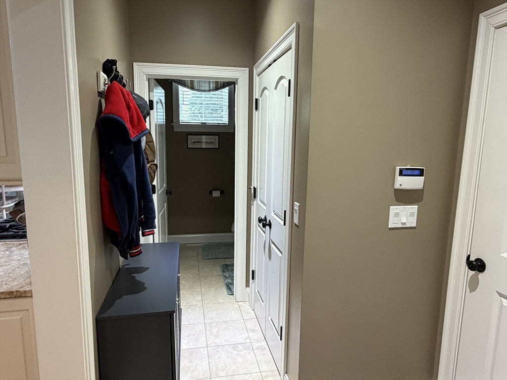 4 Tamarack Lane Sandwich, MA 02563 - Photo 21 of 42 a view of a hallway with closet and bathroom