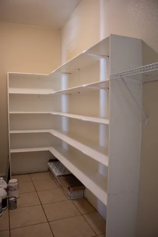 a storage room with washer and dryer
