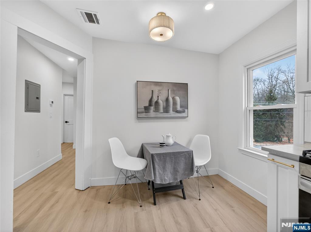 114 Colony Avenue, Unit 2 Park Ridge, NJ 07656 - Photo 5 of 12 a workspace with furniture and a window