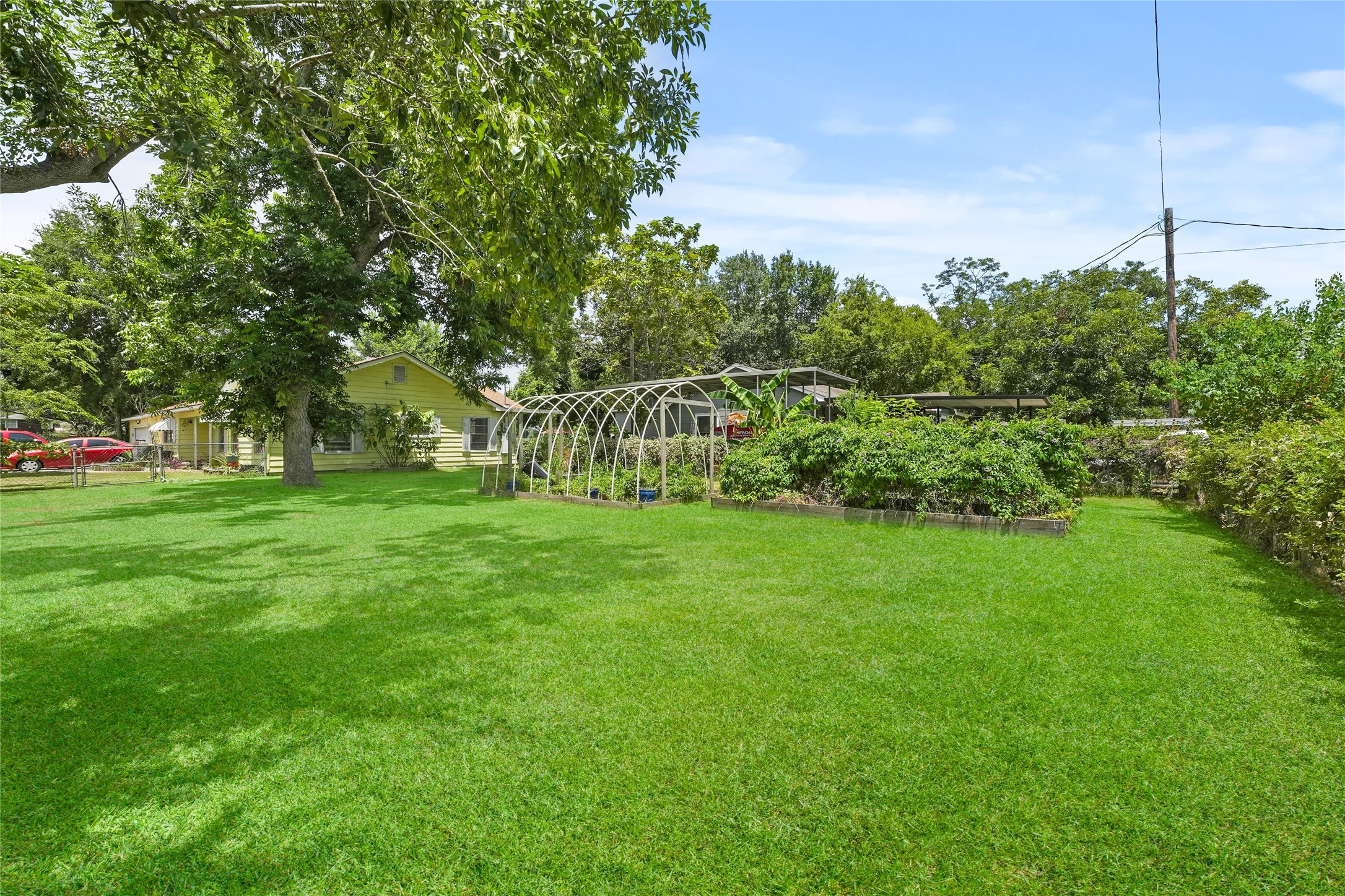 2702 Mckinney Road Baytown, TX 77520 - Photo 14 of 22 a view of a park with large trees